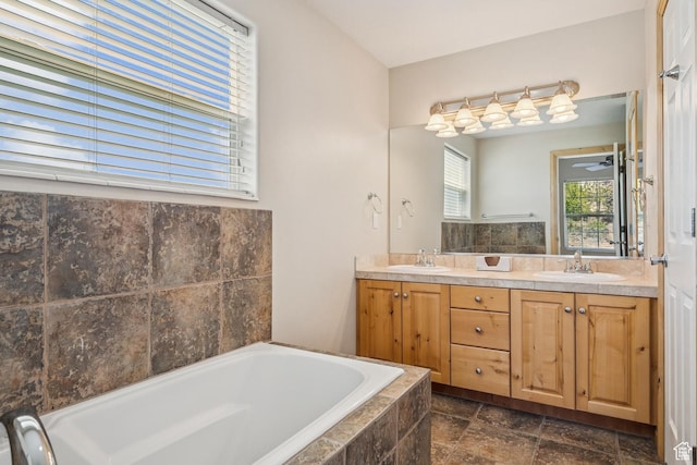 1516 S Lost Colt Dr, Heber City, UT 84032 - bathroom with a garden tub, double vanity, and stone finish floors