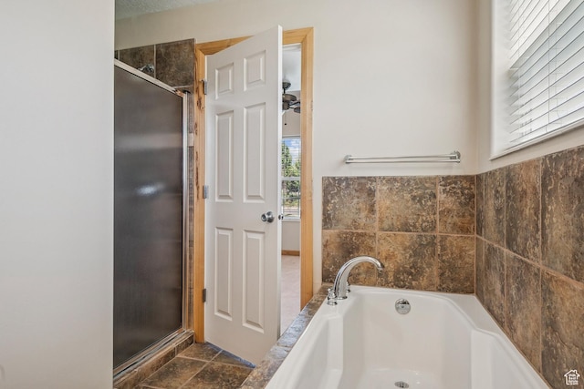 1516 S Lost Colt Dr, Heber City, UT 84032 - full bathroom with a garden tub, a stall shower, and stone finish flooring