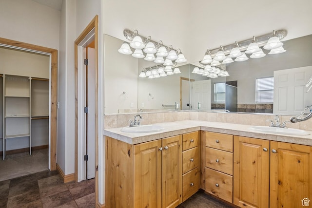 1516 S Lost Colt Dr, Heber City, UT 84032 - bathroom with double vanity and a walk in closet