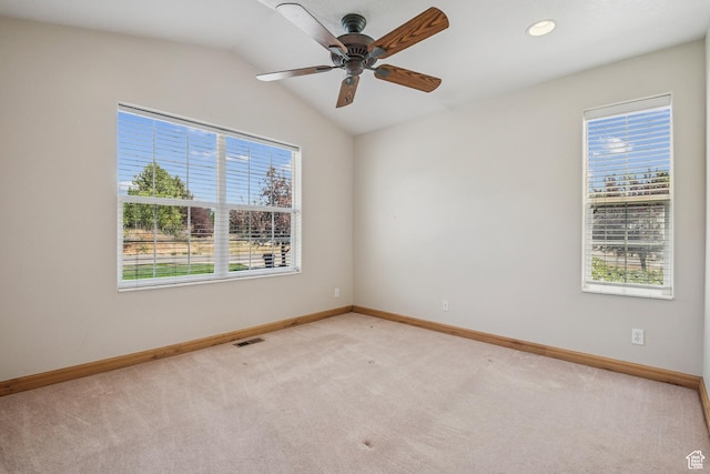 1516 S Lost Colt Dr, Heber City, UT 84032 - spare room featuring healthy amount of natural light, light carpet, ceiling fan, lofted ceiling, and recessed lighting