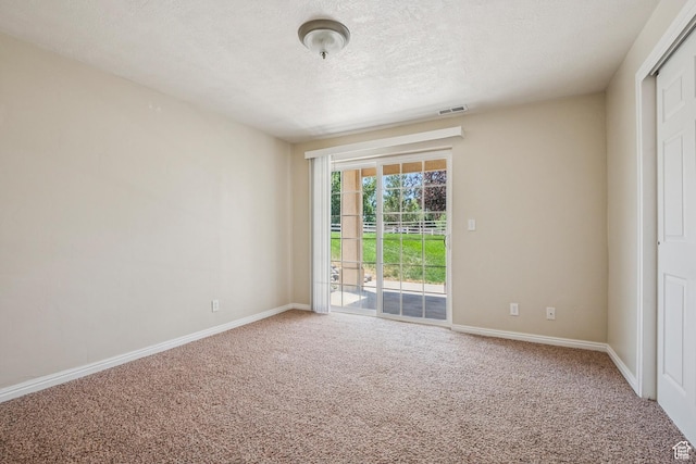 1516 S Lost Colt Dr, Heber City, UT 84032 - carpeted spare room featuring a textured ceiling and baseboards