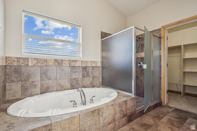 1516 S Lost Colt Dr, Heber City, UT 84032 - bathroom featuring a shower stall, a garden tub, and a walk in closet