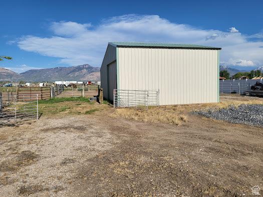 1452 N 3925 W, Marriott Slaterville, UT 84404 - view of pole building with a mountain view