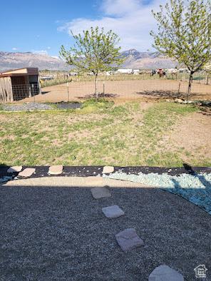 1452 N 3925 W, Marriott Slaterville, UT 84404 - view of yard with a mountain view and an outbuilding