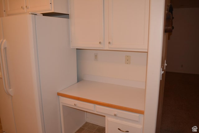 1452 N 3925 W, Marriott Slaterville, UT 84404 - kitchen featuring freestanding refrigerator, white cabinetry, and light countertops