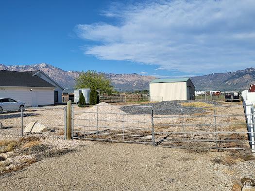 1452 N 3925 W, Marriott Slaterville, UT 84404 - view of yard featuring a mountain view and an outdoor structure