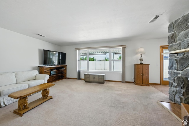 3036 S Dovetail Dr, West Valley City, UT 84128 - living area featuring carpet flooring and a fireplace