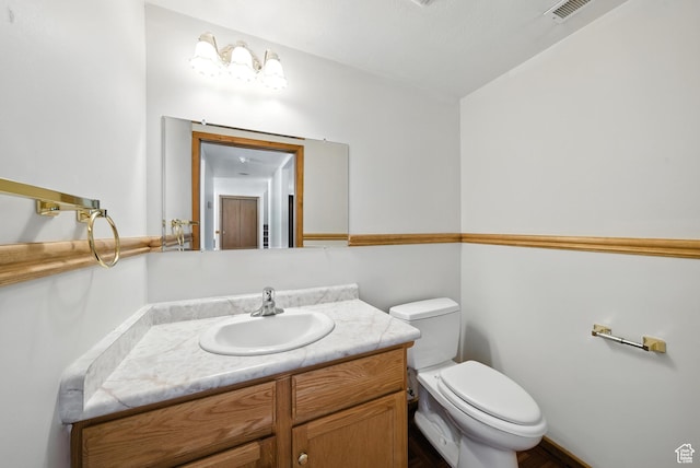 3036 S Dovetail Dr, West Valley City, UT 84128 - bathroom featuring vanity and toilet