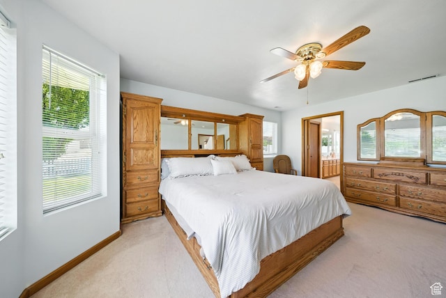 3036 S Dovetail Dr, West Valley City, UT 84128 - bedroom with light carpet and multiple windows