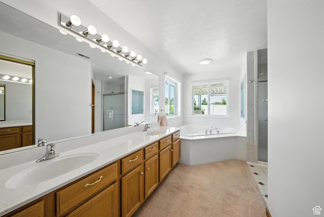 3036 S Dovetail Dr, West Valley City, UT 84128 - full bathroom featuring a stall shower, a bath, double vanity, and tile patterned floors
