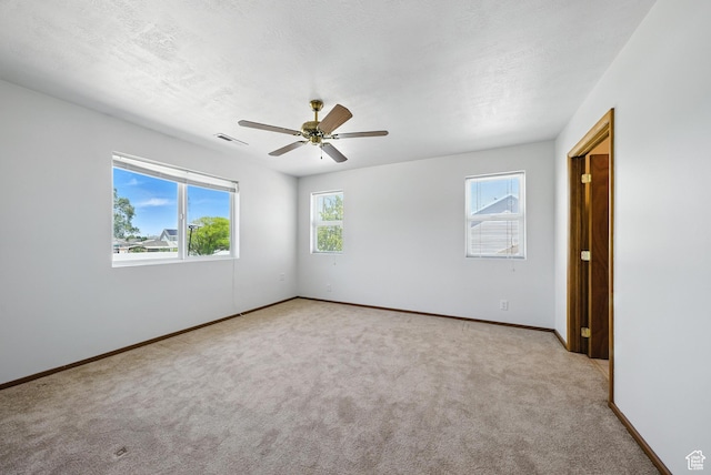 3036 S Dovetail Dr, West Valley City, UT 84128 - carpeted empty room featuring baseboards and ceiling fan