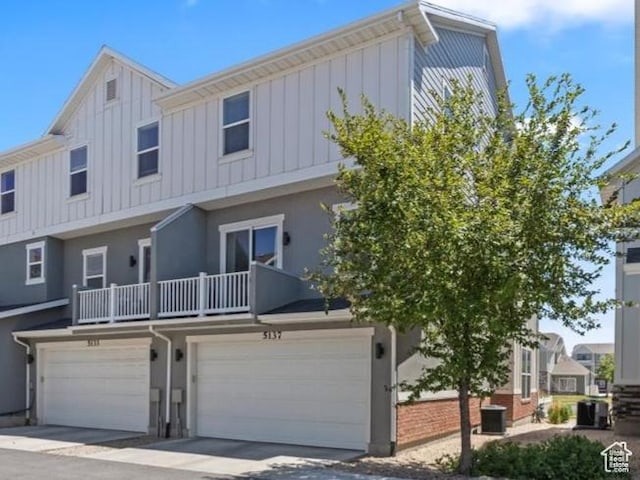 5137 W Stockfield Ln, Herriman, UT 84096 - multi unit property with board and batten siding and an attached garage