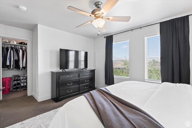 5137 W Stockfield Ln, Herriman, UT 84096 - carpeted bedroom featuring a ceiling fan and a walk in closet