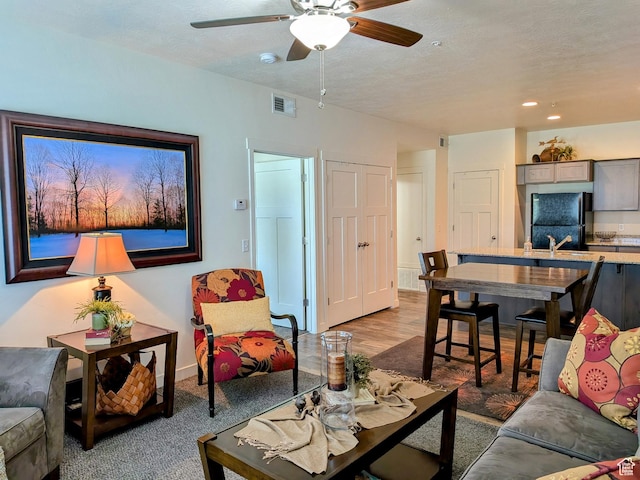796 E 500 S, American Fork, UT 84003 - living area featuring a ceiling fan, a textured ceiling, light wood finished floors, and recessed lighting