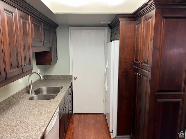 1809 W 7600 S Unit E303, West Jordan, UT 84084 - kitchen with white appliances, dark wood finished floors, and light countertops