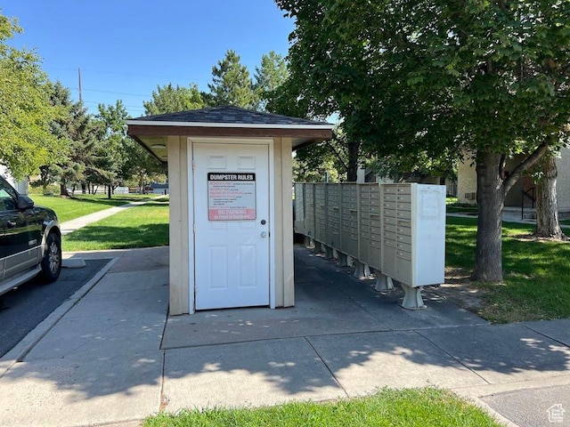 1809 W 7600 S Unit E303, West Jordan, UT 84084 - view of home's community featuring mail area and a yard