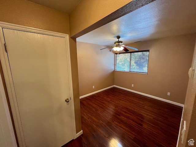 1809 W 7600 S Unit E303, West Jordan, UT 84084 - unfurnished bedroom with wood finished floors, a ceiling fan, and a closet