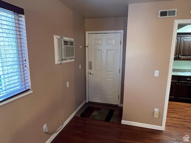 1809 W 7600 S Unit E303, West Jordan, UT 84084 - doorway with an AC wall unit and wood finished floors