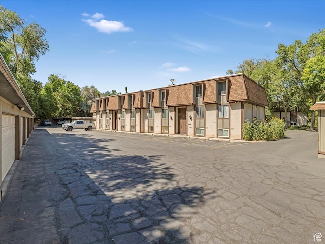 5561 S Willow Ln Unit C, Murray, UT 84107 - view of property with uncovered parking