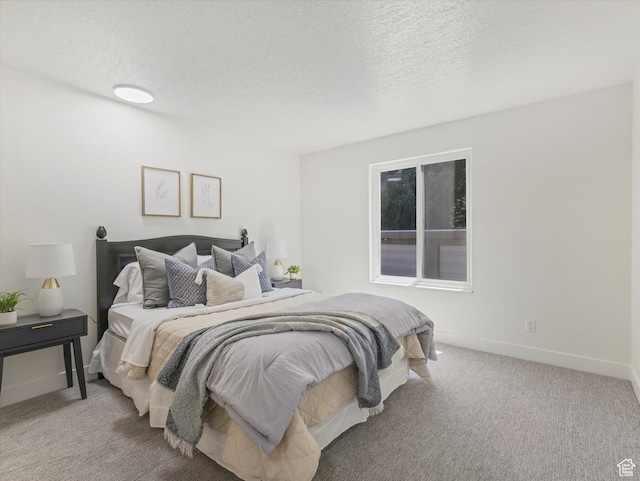 5561 S Willow Ln Unit C, Murray, UT 84107 - carpeted bedroom with a textured ceiling