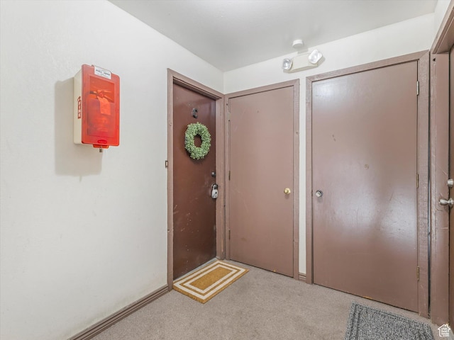 5561 S Willow Ln Unit C, Murray, UT 84107 - view of carpeted entrance foyer