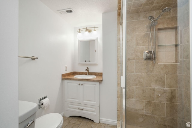 859 E 200 N, Orem, UT 84097 - bathroom featuring tile patterned floors, a tile shower, and vanity