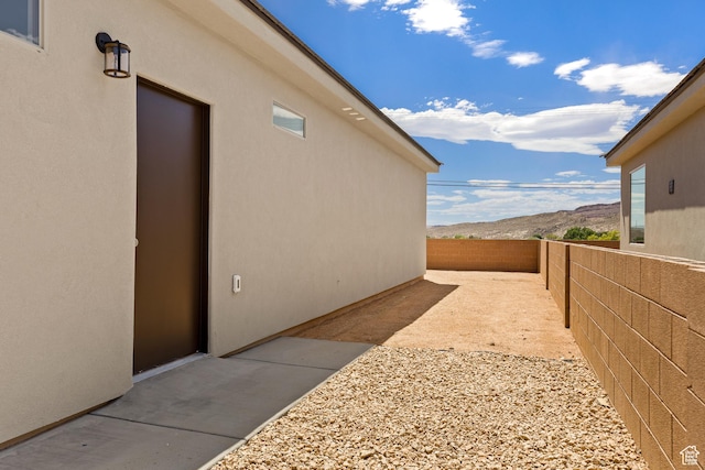 169 N 3670 W, Hurricane, UT 84737 - view of yard with a mountain view and a patio area