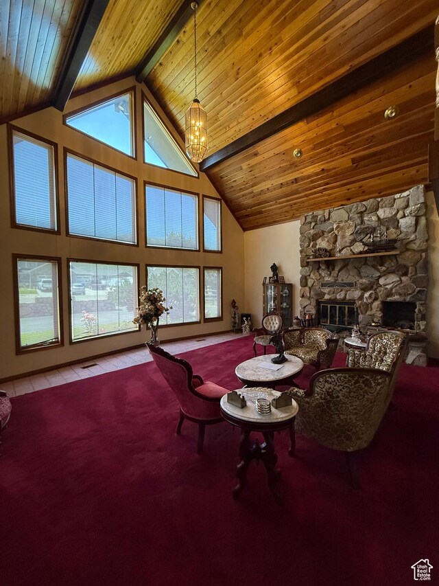 263 E Fish Hatchery Rd, Mantua, UT 84324 - living room featuring a chandelier, a stone fireplace, a wood ceiling with exposed beams, high vaulted ceiling, and carpet