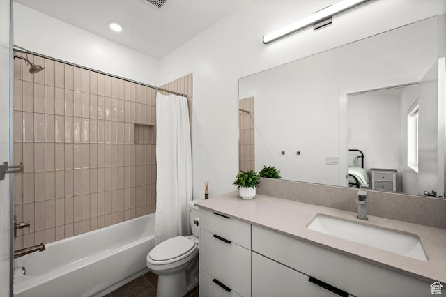 765 N 400 W Unit 205, Salt Lake City, UT 84103 - bathroom featuring vanity, shower / bath combo, tile patterned flooring, and recessed lighting