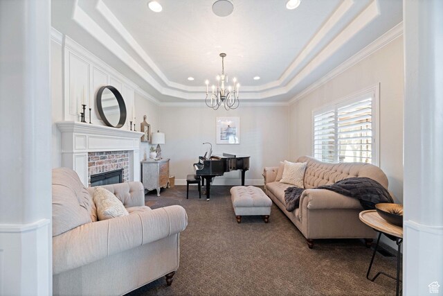 1557 S Stone Cliff Dr, St George, UT 84790 - living area with dark carpet, a raised ceiling, a chandelier, crown molding, and recessed lighting
