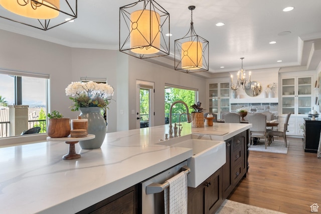 1557 S Stone Cliff Dr, St George, UT 84790 - kitchen with stainless steel dishwasher, open floor plan, a chandelier, recessed lighting, and pendant lighting