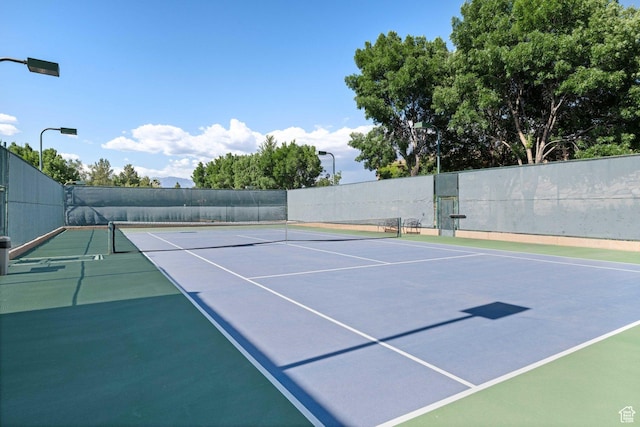 1557 S Stone Cliff Dr, St George, UT 84790 - view of tennis court with community basketball court