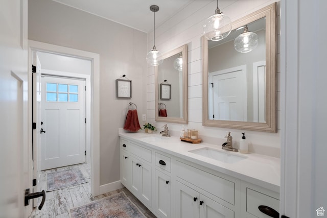 1557 S Stone Cliff Dr, St George, UT 84790 - bathroom featuring double vanity and baseboards