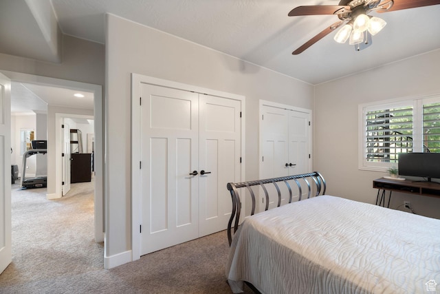 1557 S Stone Cliff Dr, St George, UT 84790 - carpeted bedroom featuring two closets and ceiling fan