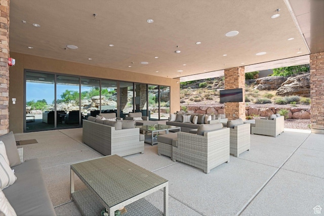 1557 S Stone Cliff Dr, St George, UT 84790 - view of patio / terrace with an outdoor living space