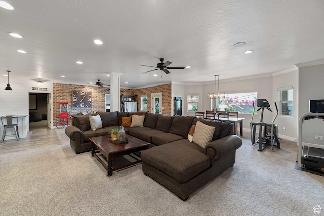 1557 S Stone Cliff Dr, St George, UT 84790 - living area featuring a ceiling fan, ornate columns, recessed lighting, light colored carpet, and ornamental molding