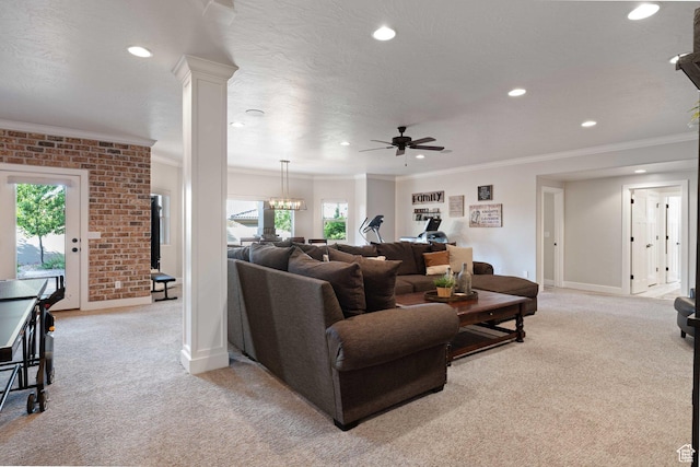 1557 S Stone Cliff Dr, St George, UT 84790 - living area featuring light colored carpet, crown molding, a ceiling fan, recessed lighting, and a chandelier