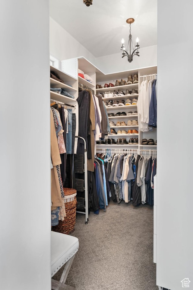 1557 S Stone Cliff Dr, St George, UT 84790 - spacious closet with carpet and a chandelier