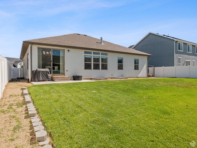2148 E 970 N, Spanish Fork, UT 84660 - rear view of property with roof with shingles, a fenced backyard, stucco siding, and entry steps