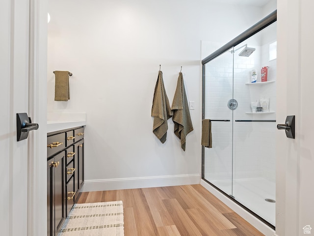 2148 E 970 N, Spanish Fork, UT 84660 - bathroom with wood finished floors, a shower stall, and vanity