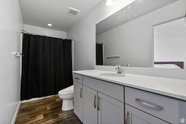 655 W 1430 S, Orem, UT 84058 - full bathroom featuring vanity, wood finished floors, and curtained shower