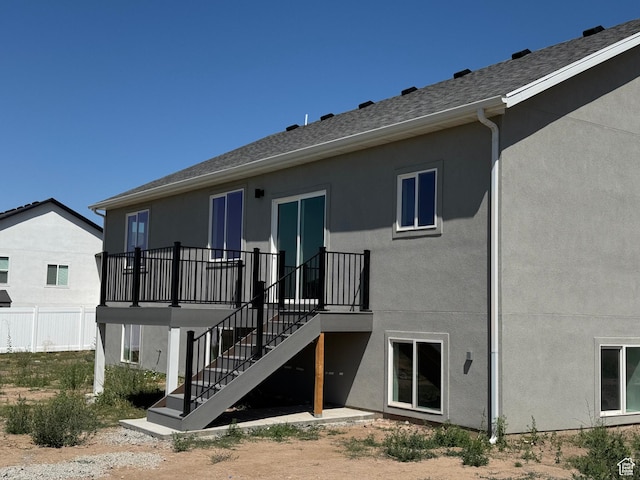 3705 W Chalgrove Rd, Taylor, UT 84401 - back of house featuring stucco siding, stairs, and a deck