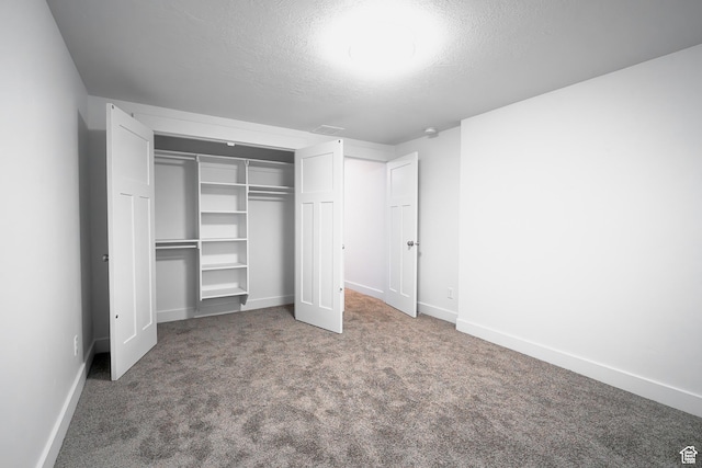 3705 W Chalgrove Rd, Taylor, UT 84401 - unfurnished bedroom featuring a textured ceiling, a closet, and carpet flooring