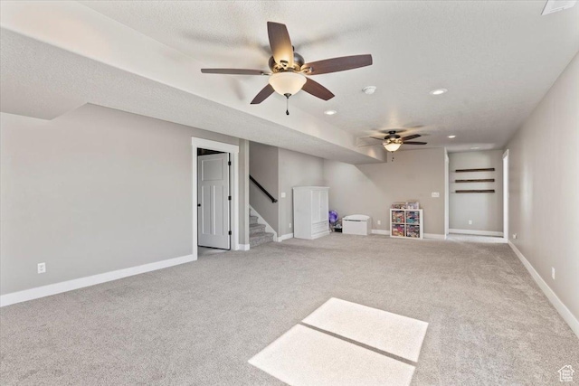 1608 S Terrace Rd, Saratoga Springs, UT 84045 - unfurnished living room with a ceiling fan, carpet floors, stairs, and recessed lighting