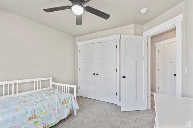 1608 S Terrace Rd, Saratoga Springs, UT 84045 - bedroom with light colored carpet, a closet, and ceiling fan