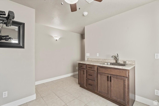 1608 S Terrace Rd, Saratoga Springs, UT 84045 - bathroom with a ceiling fan, vanity, tile patterned flooring, and a textured ceiling