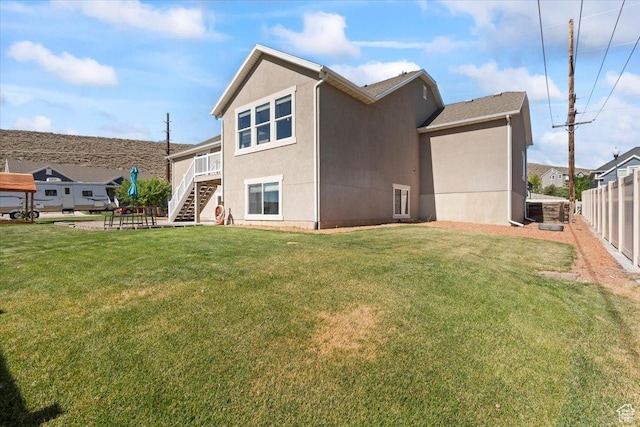 1608 S Terrace Rd, Saratoga Springs, UT 84045 - rear view of property with stairs and stucco siding