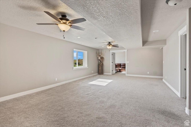 1608 S Terrace Rd, Saratoga Springs, UT 84045 - unfurnished living room featuring a textured ceiling, a ceiling fan, and light carpet