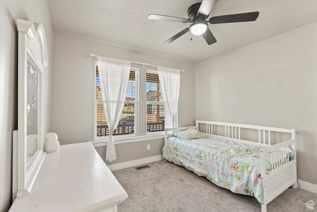 1608 S Terrace Rd, Saratoga Springs, UT 84045 - bedroom featuring carpet floors, a textured ceiling, and ceiling fan