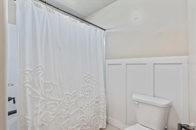 1608 S Terrace Rd, Saratoga Springs, UT 84045 - bathroom featuring toilet and shower / bath combo